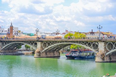 27.05.2023, Seville, Spain: Puente de Triana or Triana Bridge, is a metal arch bridge in Seville clipart