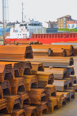 Shoreham, England, 07.05.2022: Iron bars in the cargo port. clipart