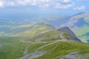 Snowdonia National Park, Epic views of mountains and valleys with blue lakes and crystal clear water clipart