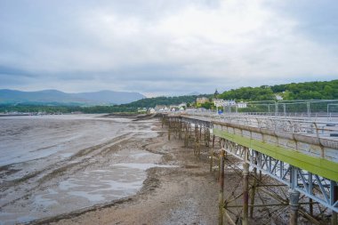 One of the longest piers in the UK. Located in a small town Bangor (photo at low tide) clipart