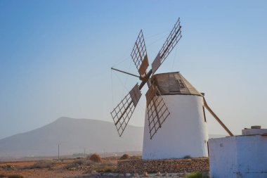 Spain, Fuerteventura, 16.12.2024: Windmills on the island that are being tried to be preserved due to their historical importance clipart