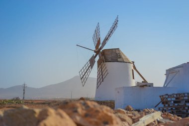 Spain, Fuerteventura, 16.12.2024: Windmills on the island that are being tried to be preserved due to their historical importance clipart