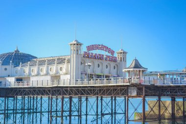 UK, Brighton, 11.1.2025: Brighton's big famous pier. Close up view during sunset clipart