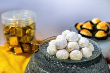 Traditional Indonesian Putri Salju cookies for Lebaran or Eid Al Fitr. clipart