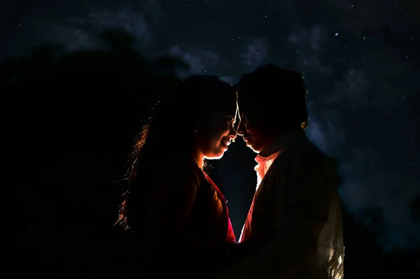 silhouette of a romantic couple in moon night. Valentine\'s day. Romantic mood. He and She. Boyfriend And Girlfriend. Love story.
