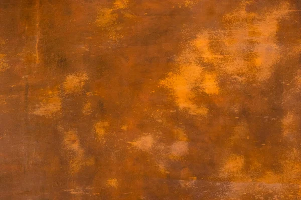Abstract brown terracotta background with spots. Old dilapidated grudge rustic paint coating on the wall