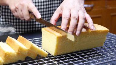 lady is cutting butter cake, people with home bakery concept