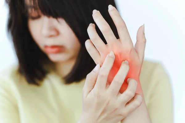 A woman\'s hands are itchy due to allergies to certain substances or skin diseases.