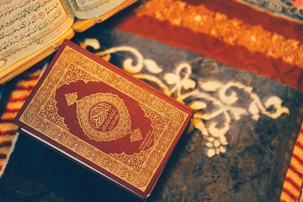 stock image Quran on prayer cloth. The concept of Islam.