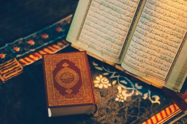 The Quran is the holy book of Islam and is considered by Muslims to be the direct word of God as revealed to the Prophet Muhammad. clipart