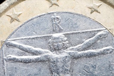 makro kısmi bakış açısı, Leonardo Davinci 'nin bir Euro bimetal madeni para üzerindeki insan vücudu rahatlaması madeni paralar ve nakit para konsepti olarak aşırı yakın plan