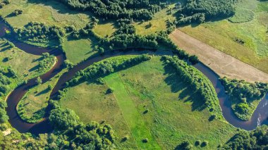 Lithuanian river Merkys and its loop. View from above. Merkys loop exposure. Dzukija national park.