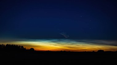 The night, sky with stars, noctilucent clouds