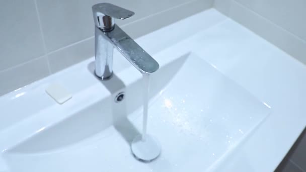 Clean Water Flows Faucet White Bathroom Sink Top View Clip — Stock Video