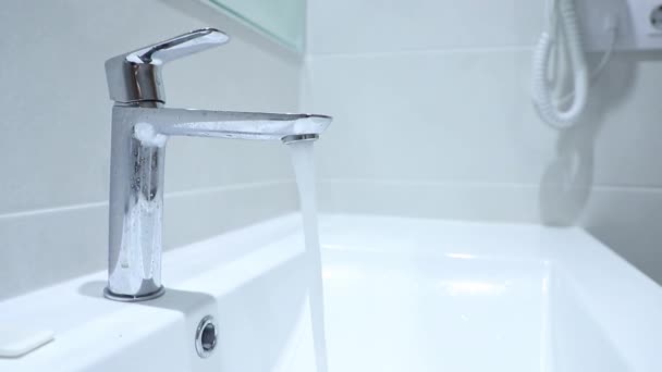 Flowing Water Faucet Fills Clean White Bathroom Sink Basin Close — Stock Video