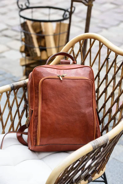 Photo Orange Leather Backpack Antique Retro Look Rustic Armchair — Stock Photo, Image