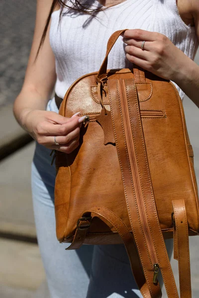 Girl White Leggings Shirt Light Brown Leather Backpack Her Hands — Stock Photo, Image