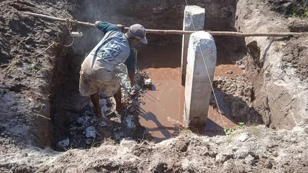 stock image Construction work in a pit - a pile foundation for a heavy structure with soft soils