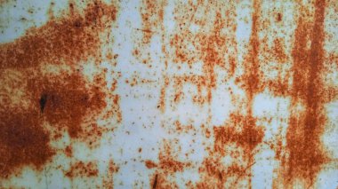 Beyaz ve kahverengi paslı metal arka plan