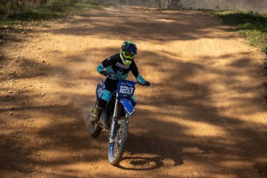 Perigueux france april 9 2023 : motocross on the dirty ground clipart