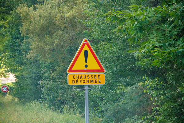 Dordogne, France July 04 2023: Sign Indicating a Deformed Road Surface Ahead