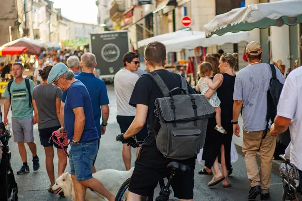 Stock image Perigueux, Dordogne, France July 19 2023: Crowd Enjoying a Stroll in the Street, Urban Tourism