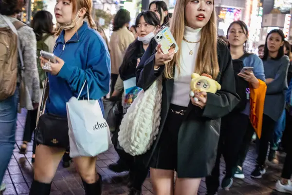 Stock image Tokyo, Japan, 27 October 2023: Crowd of fashionable young adults on Tokyo street