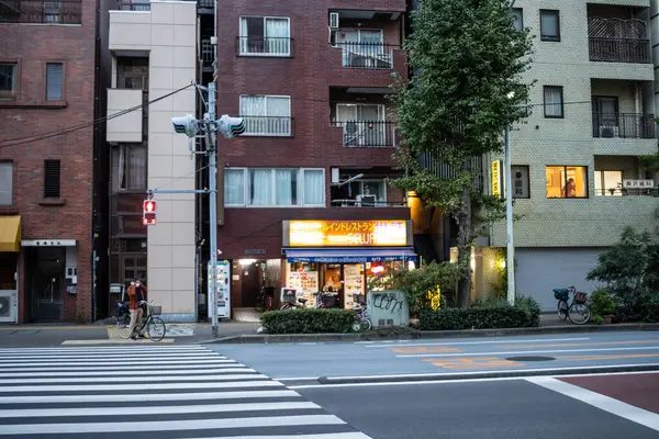 stock image Tokyo, Japan, 28 October 2023 : Evening View of a Cozy Neighborhood Street with a Convenience Store