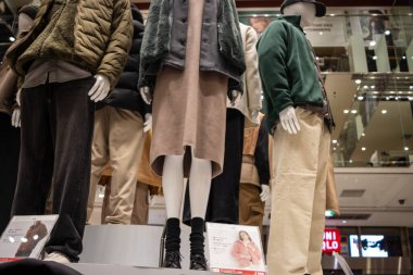 Tokyo, Japan, 30 October 2023: Winter clothing display in a fashion retail store clipart