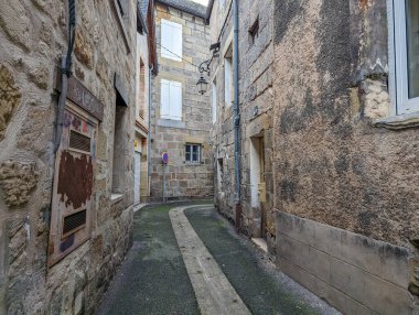 France, 3 March 2024 : Ancient Alleyway in French Village clipart