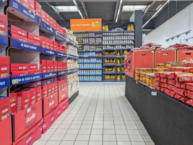 France, 6 March 2024 : Supermarket Aisle with Various Food Brands clipart