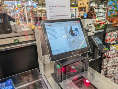 France, 23 March 2024: Self-Service Checkout at Supermarket clipart