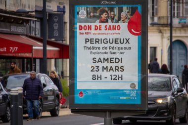 France, 24 March 2024: Blood Donation Campaign Advertisement in Urban Setting clipart