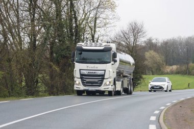 France, 30 March 2024: Commercial trucking on country road clipart