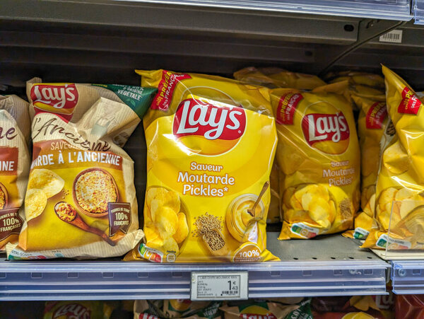 France, 23 March 2024: Lays Chips Display at a French Grocery Store