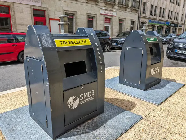 Stock image France, May 3, 2024: Recycling bins in urban setting, promoting environmental responsibility