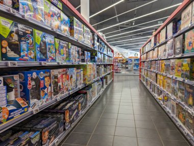 France, April 26, 2024: Interior of a supermarket aisle featuring a wide range of products