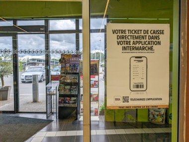 France, 3 May 2024: Intermarche app poster in store entrance clipart