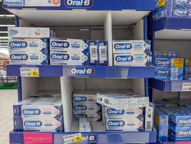 France, 8 May 2024: Oral-B Toothpaste Display on Store Shelf clipart