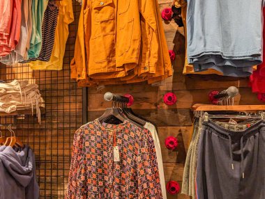 France, 8 May 2024: Colorful Clothing Display in Boutique Store clipart