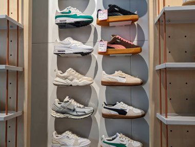 France, 08 May 2024: Display of sneakers in a shoe store clipart