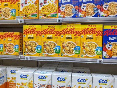 France, 08 May 2024: Supermarket shelves with various cereal brands clipart