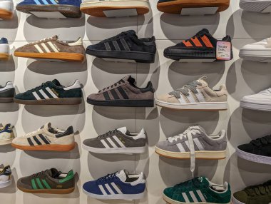 France, 08 May 2024: Display of Adidas sneakers in a shoe store clipart