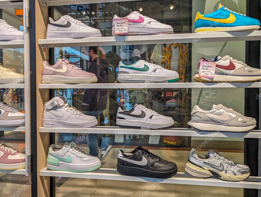 France, 8 May 2024: Various Nike sneakers displayed on store shelf