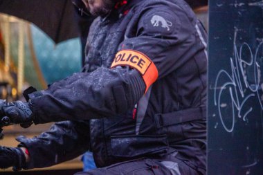 France, 22 May 2024: Close-up of a French police officer in uniform during a street patrol clipart