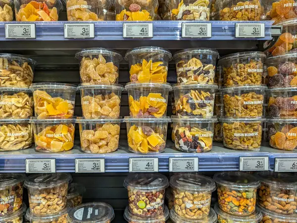 Stock image France, 1 July 2024: Close-up of assorted dried fruits and nuts on supermarket shelf