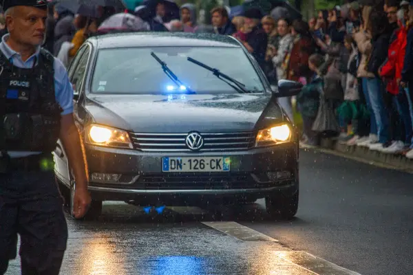 stock image France, 22 May 2024: Police car with flashing lights during a public event