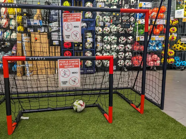 stock image France, 9 May 2024: Mini football goal display in sports equipment store