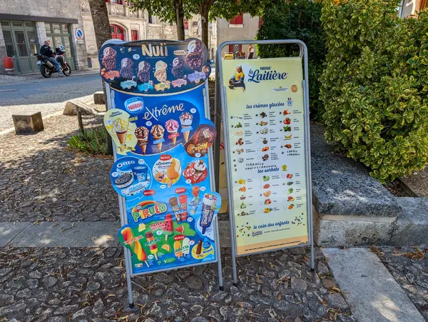 stock image France, 22 July 2024: Ice cream and beverage menu boards displayed outdoors