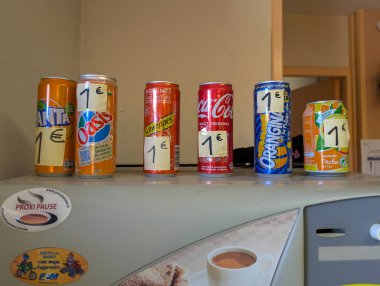 France, 10 August 2024 : Six Cans of Different Beverages Priced One Euro Each clipart